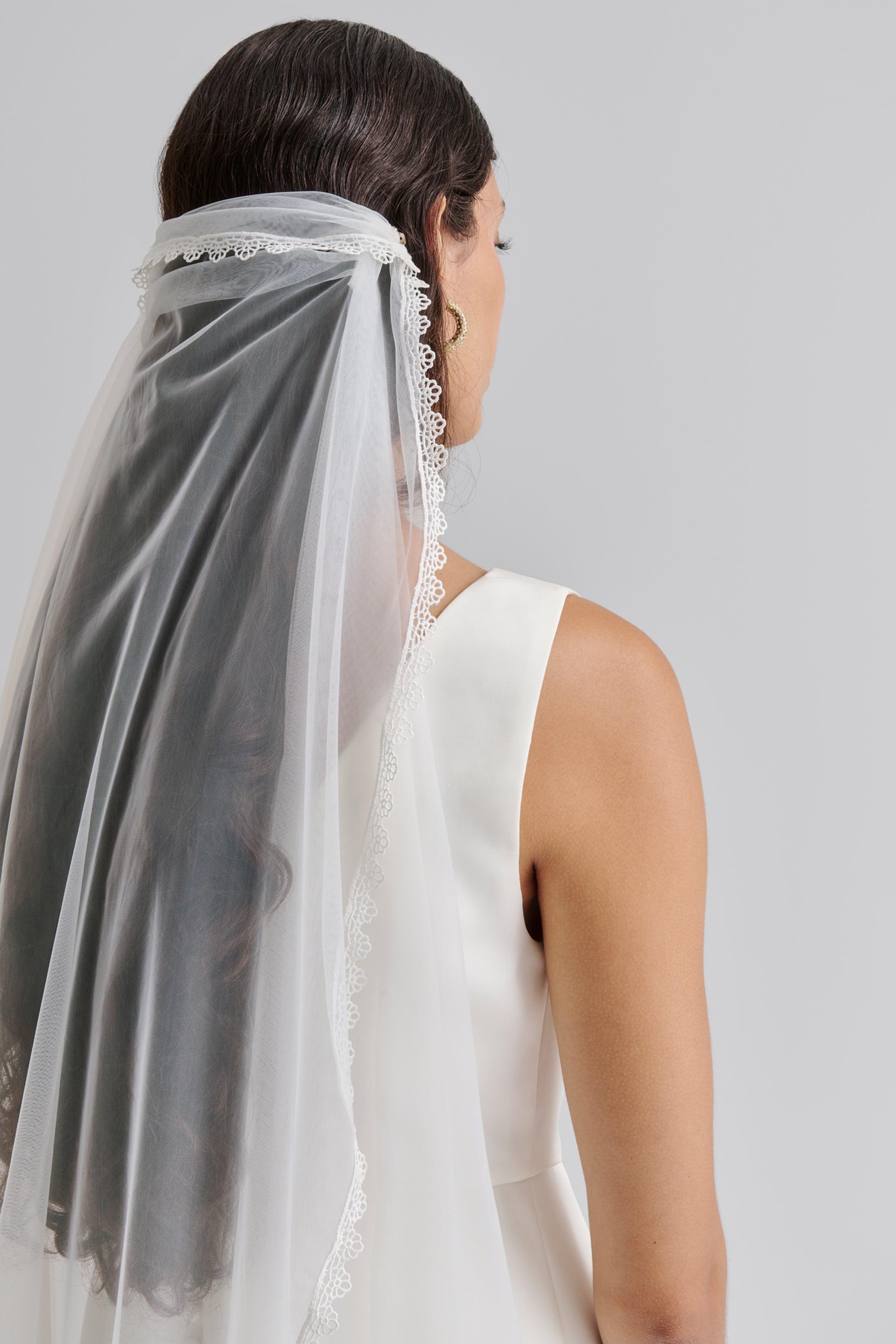 Lace trimmed cap veil product